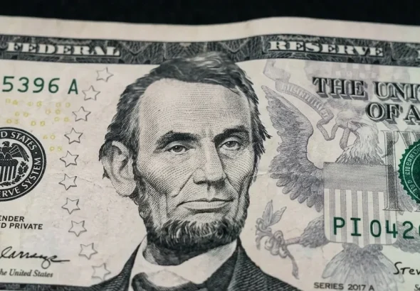 Close-up of an Abraham Lincoln 5 dollar bill