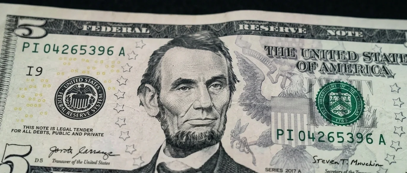 Close-up of an Abraham Lincoln 5 dollar bill